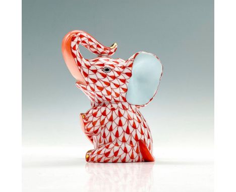 Hand-painted porcelain elephant in a red Vieux Herend fish scale design. Herend backstamp. Issued: 20th c.Dimensions: 2.25"L 