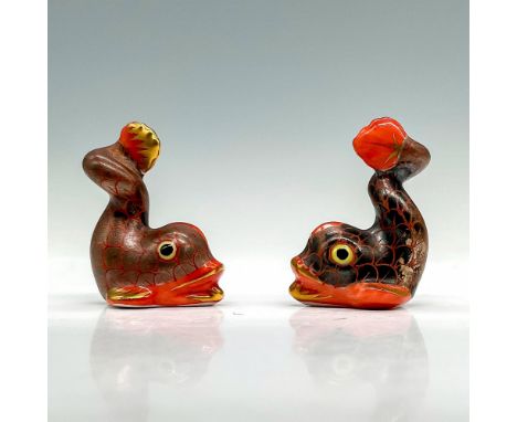 A set of 2 small medieval dolphins figures. Dark platinum-luster under glaze with a red green Vieux Herend Fish scale design.