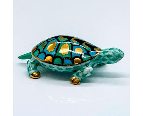 Hand painted small turtle in a green Vieux Herend Fish scale design. Herend backstamp. Issued: 2002Dimensions: 2.5"L x 1.5"W 