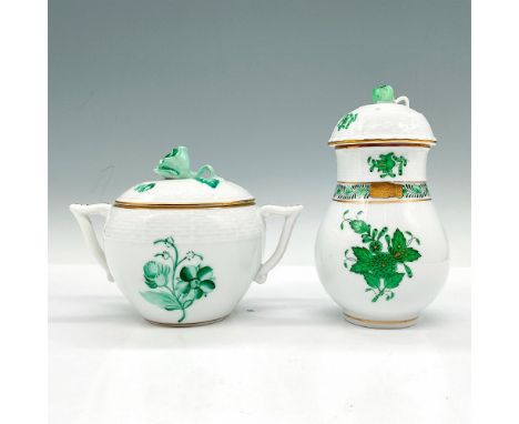 White porcelain with hand painted green floral designs, gold gilded edges, and basket weave textures. Each piece has a green 