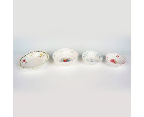 A set of 4 bowls, 3 are white, and 1 is cream colored. All bowls depict different floral patterns for their design and come i