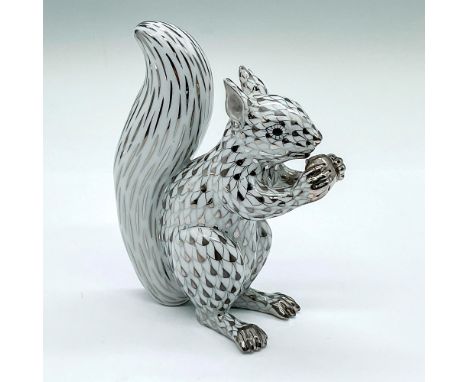 Hand painted seated squirrel holding an acorn in a Vieux Herend Platinum Fish scale design. Herend backstamp. Issued: 1998Dim