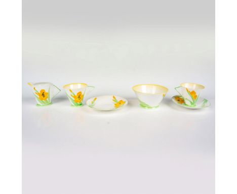 Art Deco style with yellow and green trims, adorned in a yellow gladiolus pattern. Includes a set of 2 tea cups and saucers, 