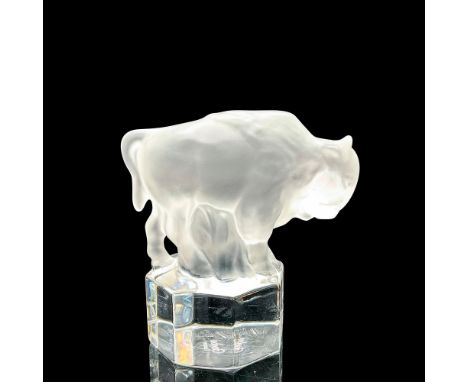 Frosted crystal buffalo mounted on a clear crystal octagon shape base. Goebel Hummel acid backstamp. Dimensions: 2"L x 3.25"W