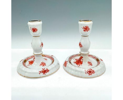 Hand-painted pair of porcelain candlesticks with rust-red floral bouquets, garlands, and gold gilding. Herend backstamp. Each