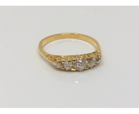 An antique gold five stone old-cut diamond ring, size R CONDITION REPORT: Marks rubbed. 3.1g