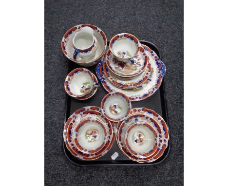 A tray containing a 19th century twenty one piece F and Sons geisha tea service 