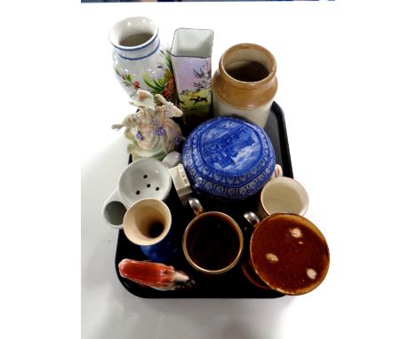 A tray containing miscellaneous china to include Staffordshire greyhound, Ringtons Maling caddy, Burleigh ware lustre vase de