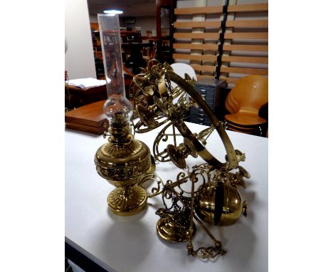 A 19th century brass rise and fall hanging oil lamp (no shade)