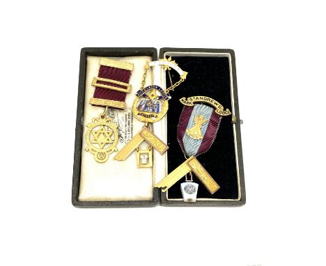 A 9ct gold and enamel Masonic brooch (approximately 28 grams), a further 9ct gold brooch suspended on ribbon, together with a