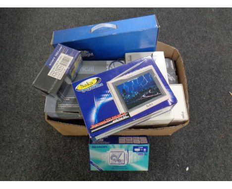 A box containing a quantity of boxed electricals including mini cooker, mini colour TV, Rotary shavers, portable mini disc re