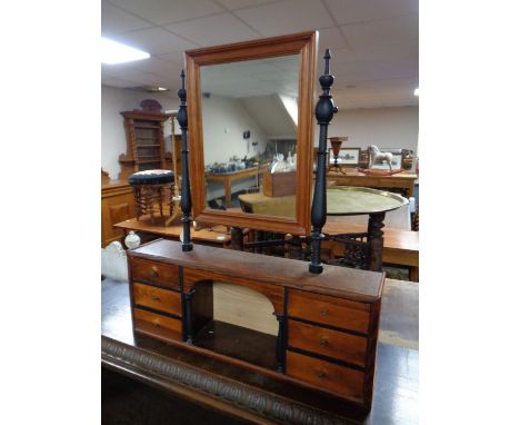 A stained pine mirrored shelf 