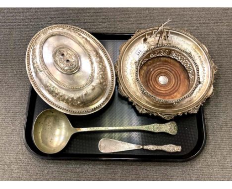 A quantity of antique and later silver plated items to include soup ladle, breakfast dish and cover, wine coaster, etc  