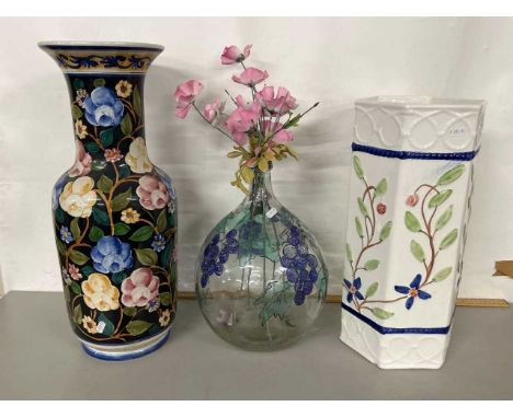 Mixed Lot: Modern ceramic stick stand, a large modern floral vase and a glass carboy decorated with grapes