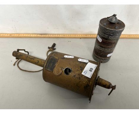 Vintage clockwork spit jack together with a further small metal covered container marked Presented by Gurkha Officer 22nd Oct
