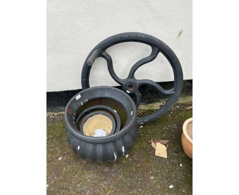 Mixed Lot: Cast iron wheel from a root chopper together with a black painted planter and others smaller
