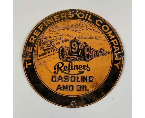 An enamel on metal advertising sign inscribed 'Refiners Gasoline and Oil Company', dia. 30cm
