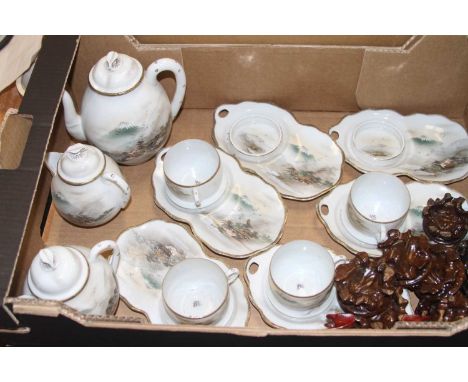 A Japanese eggshell porcelain part tea service