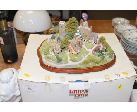 A Lilliput Lane resin model of Little Saxham St Edmunds, width 37cm, boxedAppears in good condition, free from cracks, chips 