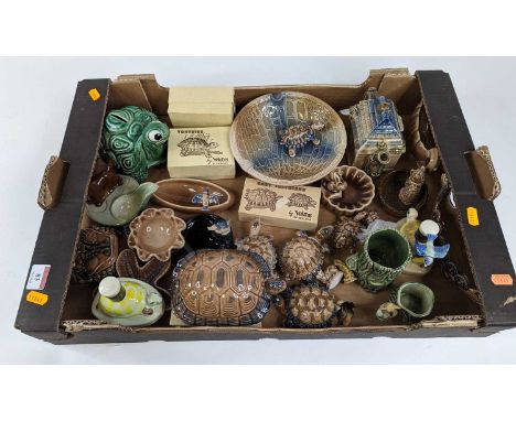 A collection of predominantly Wade porcelain tortoises, together with other ceramics to include pin trays 
