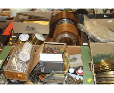 A collection of vintage clock and barometer parts