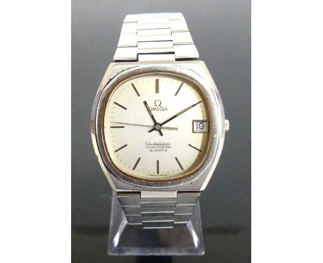 A gent's Omega steel cased Constellation quartz chronometer bracelet watch having signed silver dial with baton markers, date