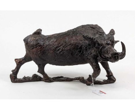 A carved oak model of a boar, shown in standing pose, length 39cm
