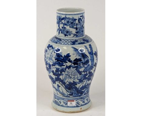 A Chinese porcelain vase of baluster shape, underglaze decorated with bird amongst flowers, height 38cmHairline crack to neck