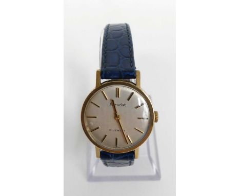 A lady's Accurist 9ct gold cased wristwatch, having 17-jewel manual wind movement, signed silvered dial, case dia.26mm, on bl