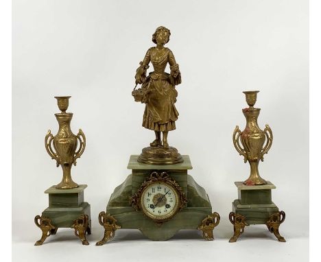 A late 19th/early 20th cenury onyx and gilt metal figural clock garniture, h.52cm