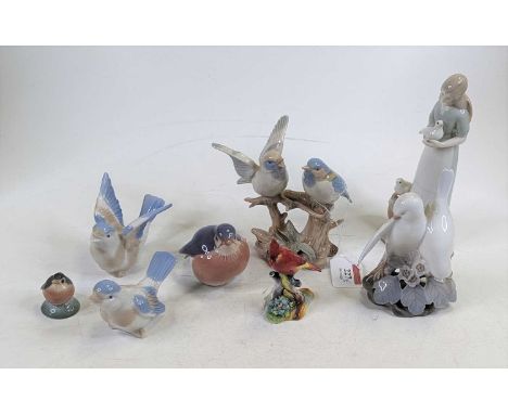 *A Royal Copenhagen porcelain figure group of two doves modelled on a naturalistic floral base, height 14cm, together with a 