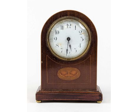 An Edwardian walnut and boxwood strung dome top mantel clock, the enamel dial with Arabic markers, height 21cm 