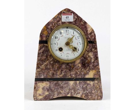 A late 19th century French rouge marble cased mantel clock of lancet shape, the enamel dial with Arabic numerals and floral s