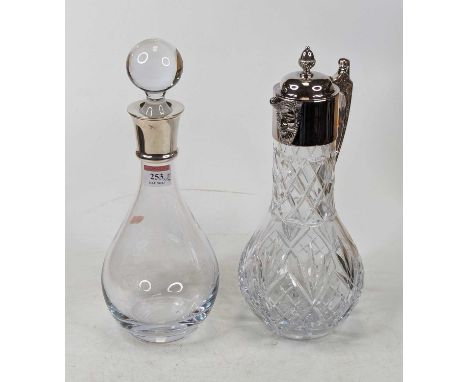 An Elizabeth II glass decanter having a silver collar, by Carr's of Sheffield, 2009, height 31cm, together with a cut glass c