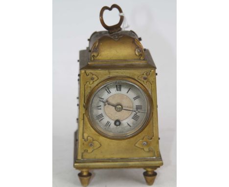 A 19th century brass mantel clock, the silvered dial showing Roman numeralsRuns when started but we haven’t tested it for lon