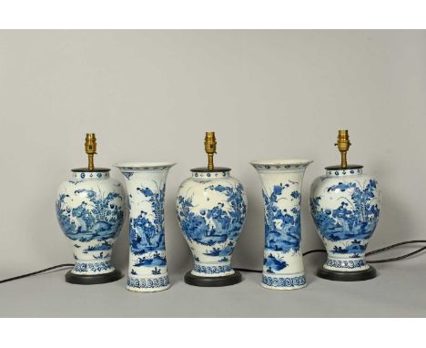 A garniture of five Delft vases, c.1760, comprising three baluster and two sleeve vases, each painted in blue with two Chines