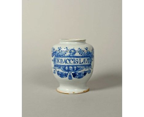 A London delftware drug or apothecary jar, c.1680, painted in blue with two peacocks and leafy branches flanking the haloed h