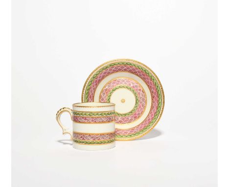 A Bristol coffee can and saucer, c.1775, painted with bands of pink scale decoration within leaf garlands, the can with a cri