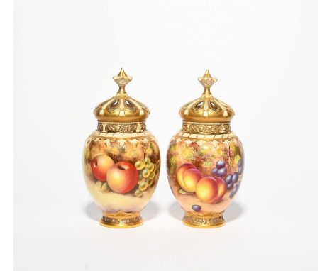 A pair of Royal Worcester pot pourri vases with inner and outer covers, 2nd half 20th century, of shape 2048, painted by Free