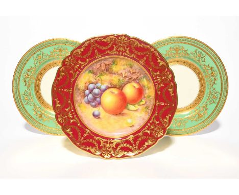 A Royal Worcester cabinet plate, 20th century, painted by R Lewis with an arrangement of fruit within a claret border with a 