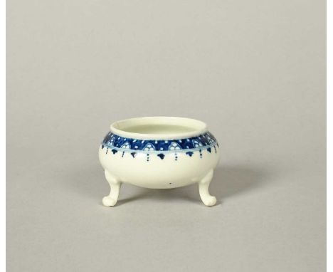 A rare Worcester blue and white tripod salt, c.1765-70, of squat circular form in the Chinese manner, painted with a wide 'bu