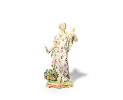 A Bristol figure of Autumn from the Classical Seasons, c.1772-75, modelled as a Classical maiden in a flowing patterned robe,