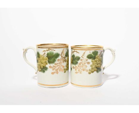 An unusual pair of Worcester ale mugs, c.1790-1800, finely painted with three branches of hops alternating with gilt foliate 
