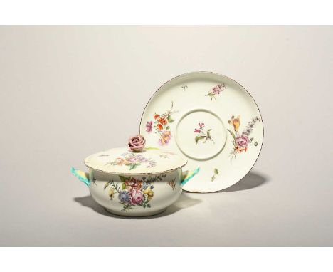A Chelsea ecuelle with cover and stand, c.1755, the circular form finely painted with arrangements of flowers and single scat