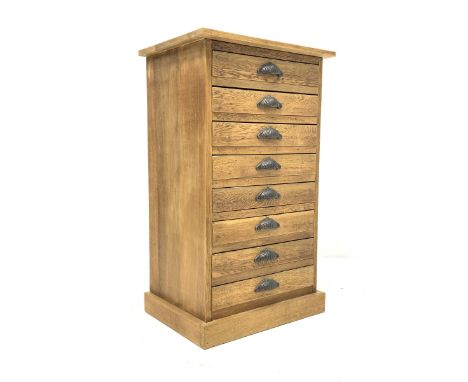 20th century light oak filing chest, fitted with eight drawers, raised on plinth base, W55cm, H94cm, D41cm - Condition Report