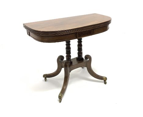 Georgian mahogany tea table, demi-lune fold over top with reeded moulding, sectional cockbeaded frieze with central figured p