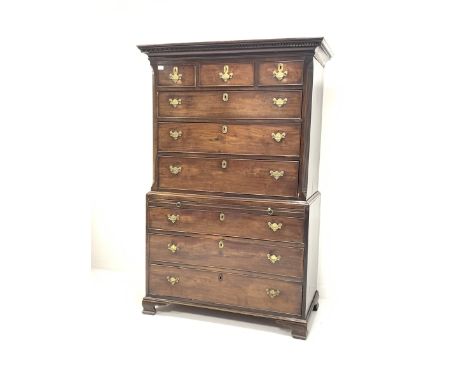George III mahogany chest on chest, the upper section with dentil cornice and canted corners fitted with three long and three