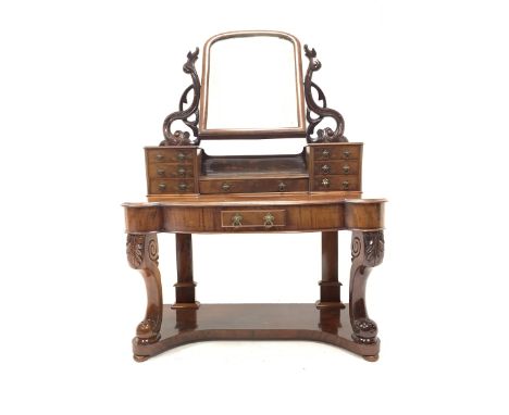 Victorian mahogany duchess dressing table with arched swing mirror over trinket drawers. Serpentine top with frieze drawer, r