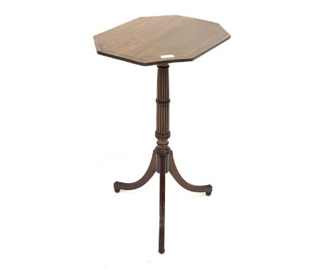 Regency mahogany tripod table, octagonal top with chequered inlayed band, over reeded and ring turned column and raised on re
