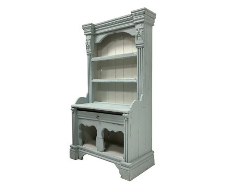 19th century Irish painted oak small cottage dresser, moulded cornice over two carved green man masks and fluted pilasters, e